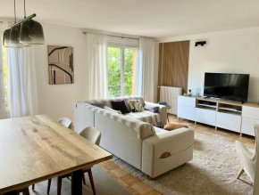 Chambre dans appartement élégant proche de Paris